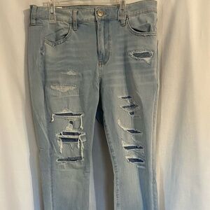 American Eagle light wash Next Level Stretch jegging women's 12 Long distressed